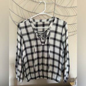Cute black and white plaid top with lace-up neckline and elastic waist